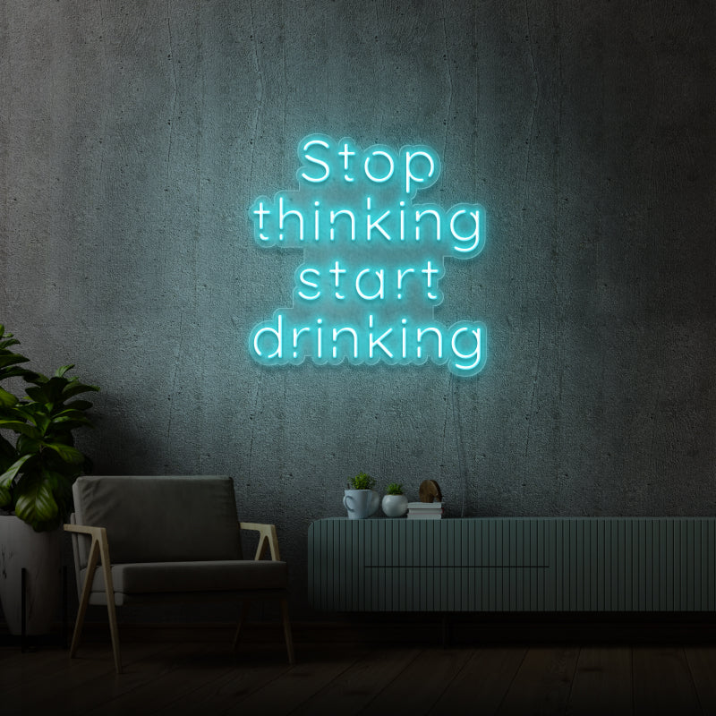 STOP THINKING START DRINKING' - signe en néon LED